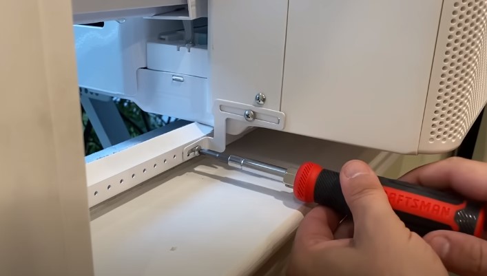 Securing the AC with Screw