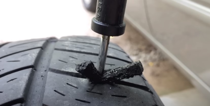 Inserting the tire plug